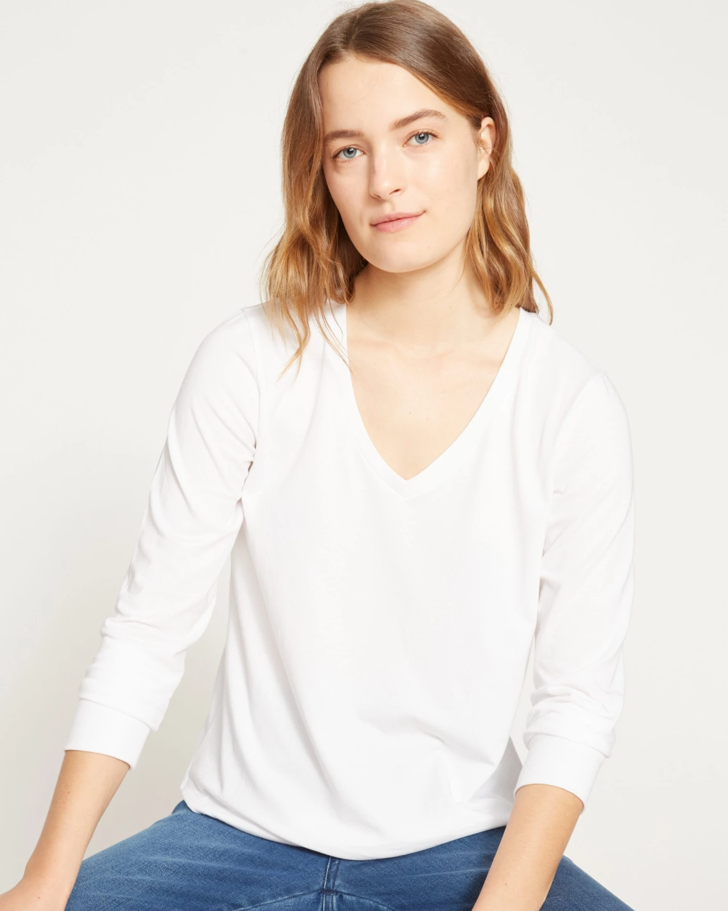 Women's Ultra Soft White V-Neck Long Sleeve Tee with Curved Hem 3 Women's Ultra Soft White V-Neck Long Sleeve Tee with Curved Hem