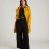 Derjon Trench Coat 2.0 - Mustard Water-Repellent Outerwear 1 Derjon Trench Coat 2.0 - Mustard Water-Repellent Outerwear -UNIVERSAL STANDARD USOU0064N 018 Derjon Trench Coat Mustard 001 106 5d1c96a2 c4af 4022 a8fe 9dd4cb1b7b18