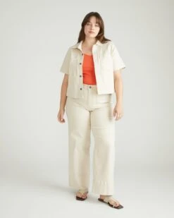 Flynn Short Sleeve Denim Shacket - Ecru 15 Flynn Short Sleeve Denim Shacket - Ecru -UNIVERSAL STANDARD USTO1938 701Denim Cropped Shacket in Overdyed DenimEcru 002 013